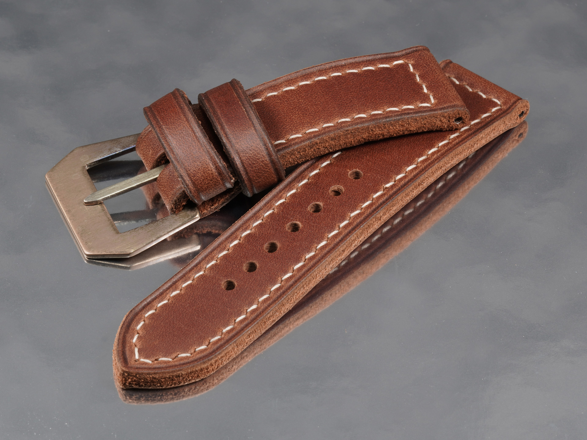 Aged rust brown 24mm strap with integrated sewn in pin buckle