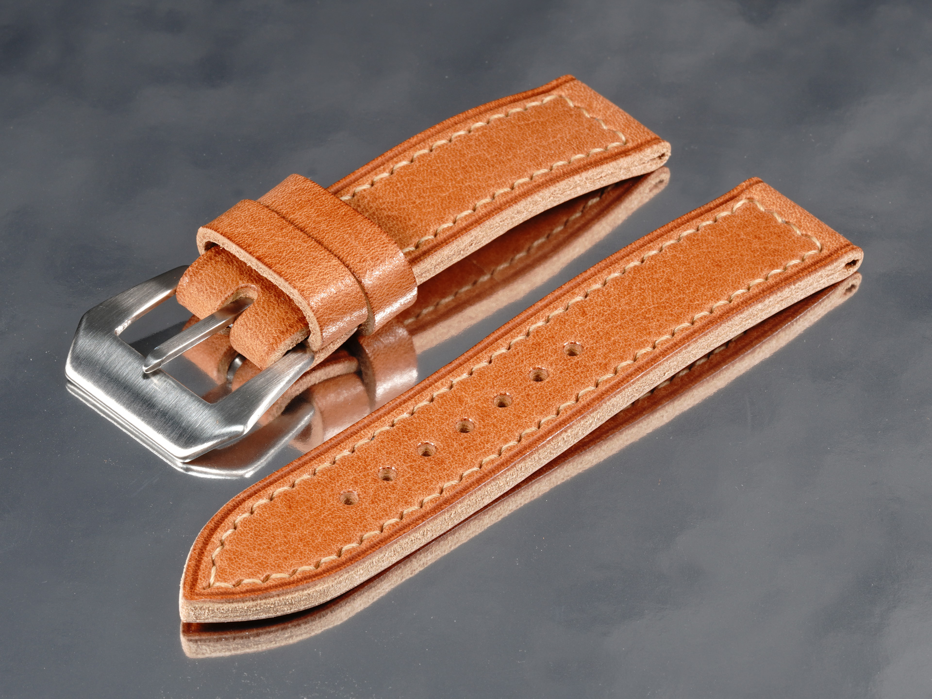 Profile view of 4.3mm thick custom tan leather strap for 42mm Panerai Luminor