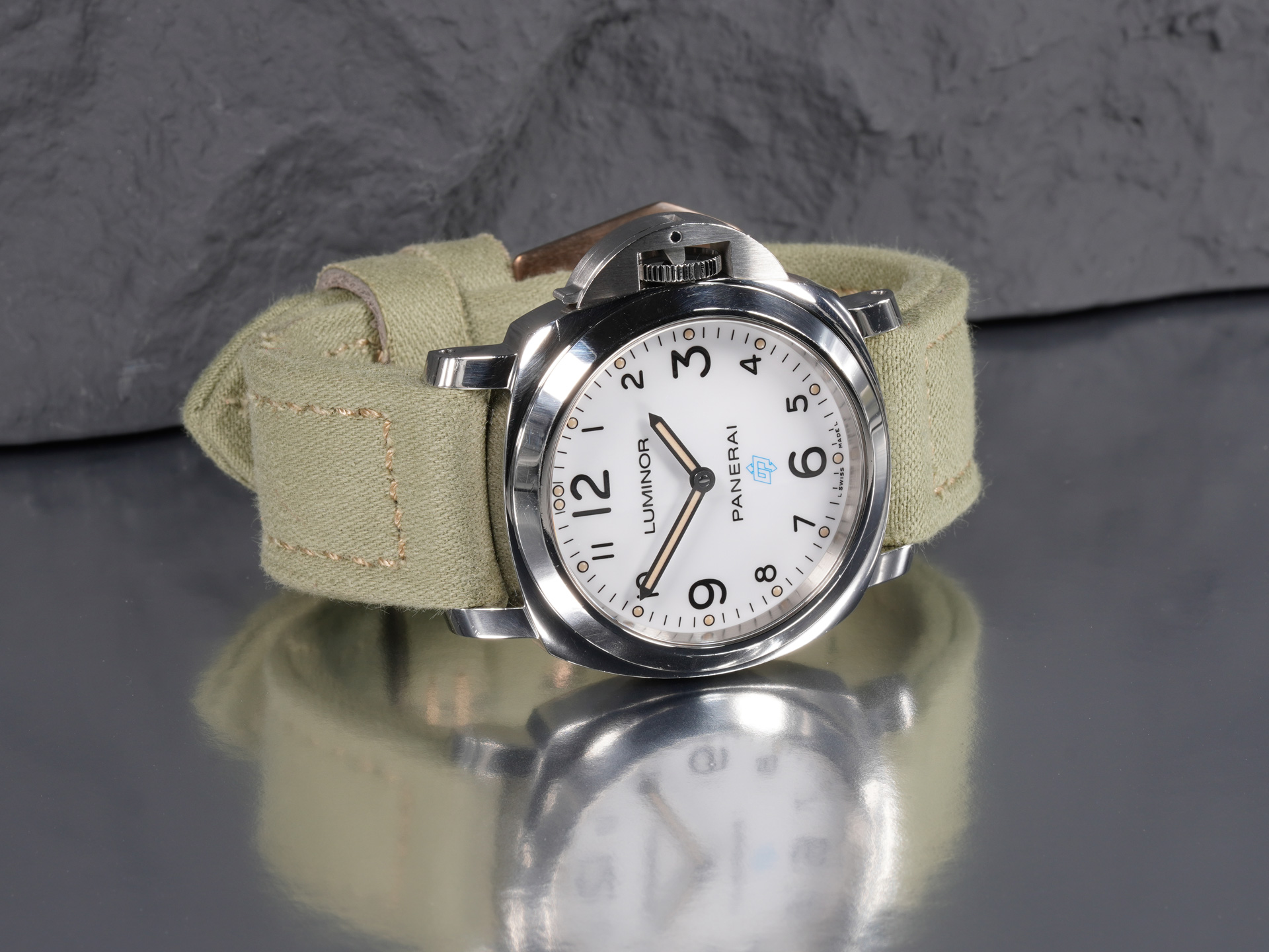Panerai PAM00775 white dial paired with 44mm light green canvas strap side profile