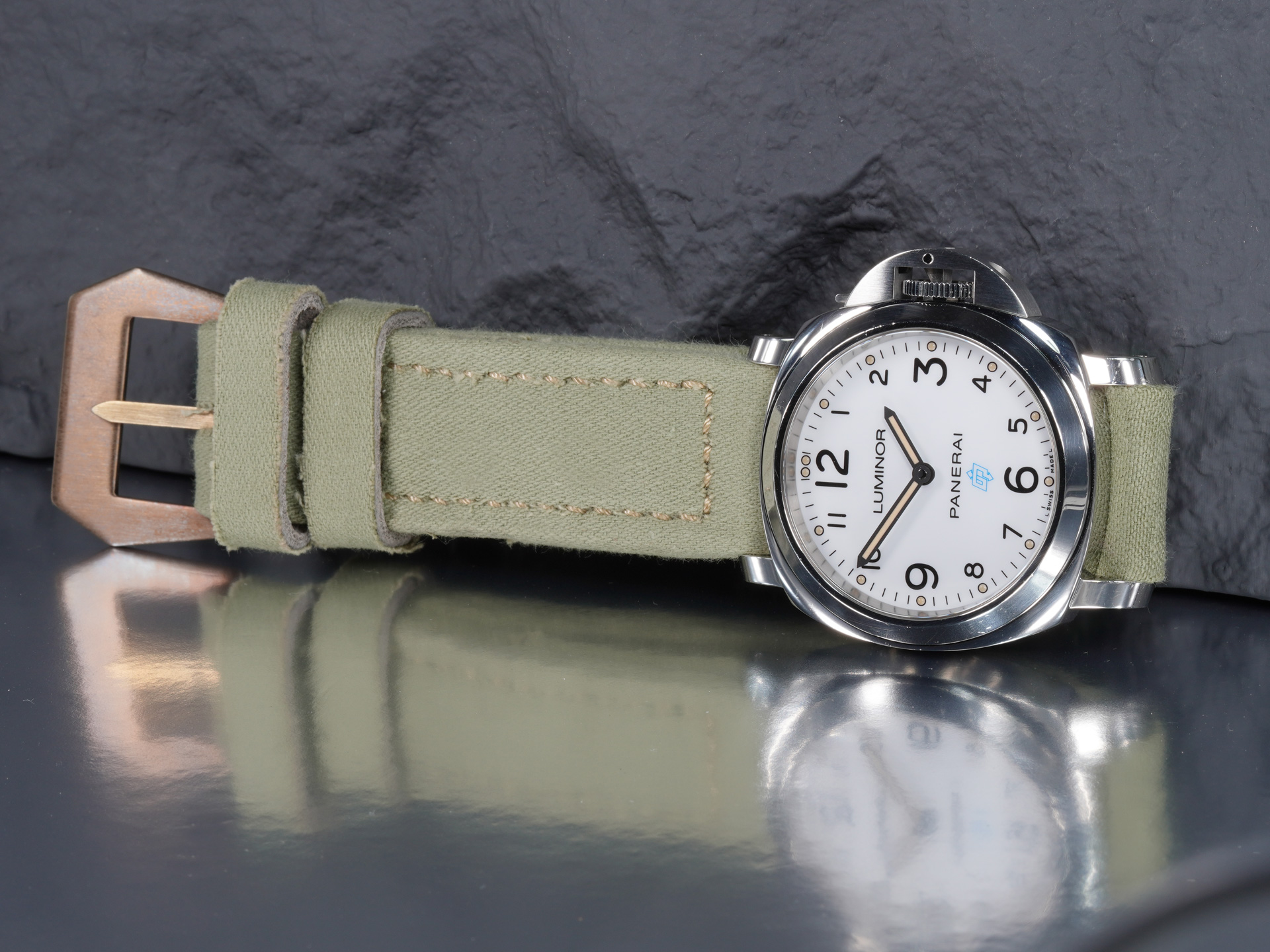 Hand-stitched light green canvas strap 24mm lug taper on Panerai PAM 775