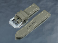 Macro view of heavy-duty army green canvas Panerai strap weave and hand-finished edge burnish from Marcello Straps.